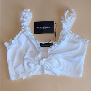 PrettyLittleThing - White Rib Ruffle Detail Bralet